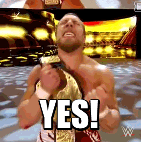 TV gif. Daniel Bryan holds a WWE belt over his shoulder, bringing his fists down while he yells with joy, “YES!”