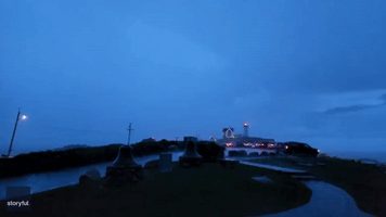 Streaks of Lightning Illuminate Coastal Maine's Night Sky