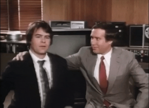 Chevy Chase Hug GIF by swerk