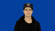 Celebrity gif. Brendon Urie looks at us with furrowed brows and a frown. He shakes his head and gives us a big thumbs down.