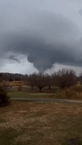 Funnel Cloud Spins During Tornado-Warned Storm in Henderson, Tennessee