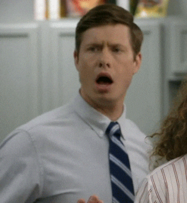 TV gif. Anders Holm as Anders Holmvik on Workaholics looks over at someone and gasps with his eyebrows furrowed like he’s a bit upset. He then lifts his eyebrows up and tilts his head in surprise.