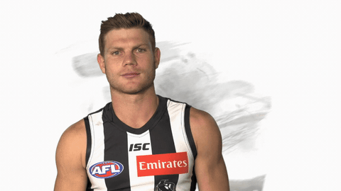 adams shrug GIF by CollingwoodFC