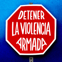 Digital art gif. Cartoon stop sign with large white all-caps letters that read, "Detener la violencia armada," all against an ombre blue backdrop.