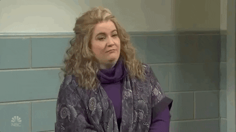 SNL gif. Aidy Bryant stares off, thinking with a shocked expression on her face. She blinks and then says, Oh,” and frowns as if impressed.