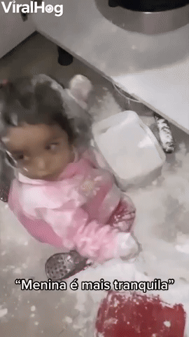 Little Girl Makes a Mess with Flour