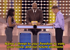 Family Feud gif. Host Steve Harvey stands between two contestants, a black woman and a white man. Steve asks, “Name a threat to your freedom to vote, your voice, and our future elections.” The woman slaps the buzzer and says, “Trump Republicans.” Steve looks at the board of survey results that already has the first answer, “Racism.” The answer, “Trump Republicans,” appears in the second spot.