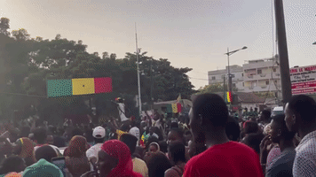 Senegal Fans Celebrate as Team Advances in WC
