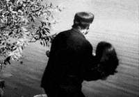 throwing get out GIF