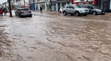 'Why's It So Strong?': Storm Babet Floodwaters Rush Down Streets in Cork