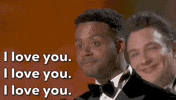 Oscars 2024 gif. The Last Repair Shop wins Best Documentary Short. Kris Bowers smiles genuinely at the crowd. Without blinking, he says repeatedly, "I love you. I love you. I love you." 