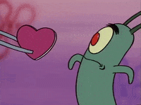 SpongeBob SquarePants gif. Plankton reaches out to accept a pink heart, given to him by someone out of frame, and appears surprised and bashful.