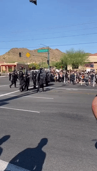 Loud Bangs Heard as Police Face-Off With Protesters Outside Phoenix Trump Rally