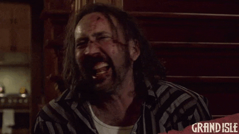 screenmediafilms giphyupload laughing bloody nicolas cage GIF