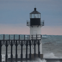Large Waves Crash Into Lighthouse in Lake Michigan