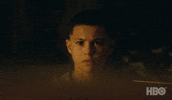 TV gif. Javon Walton as Ashtray on Euphoria. He stares at something unblinkingly and looks upset as he witnesses the scene.