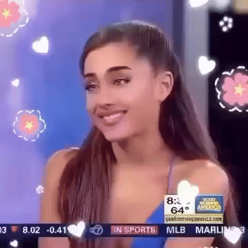 Blushing Ariana Grande GIF
