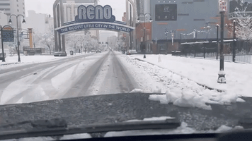 Snow Covers Reno Amid Winter Storm Warning