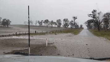 Paddocks and Roads Flooded by Much-Needed Rain in Drought-Affected Regional New South Wales