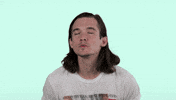 Celebrity gif. Chris Farren does numerous passionate air kisses as red animated smooches appear and disappear in the air. 