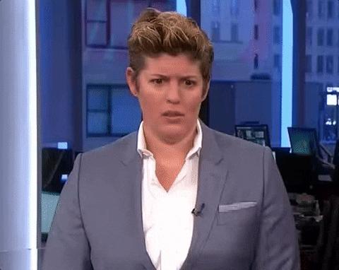Celebrity gif. Sally Kohn sits behind a news desk, shakes her head, then drops her face onto her palm.