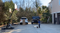 Young Fan Celebrates Super Bowl Sunday by Showing Off Football Trick Shots