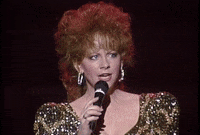 Fancy Eyebrow Raise GIF by Reba McEntire