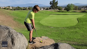'What I Tell Ya?' 8-Year-Old Chips in Golf Shot From the Top of a Rock