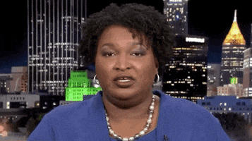 news democracy voter suppression voter registration stacey abrams GIF