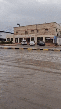Cars Drive Along Flooded Road in Eastern Saudi Arabia as Region Hit With Stormy Weather