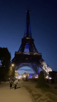 Eiffel Tower Glows Blue and White in Support of Israel