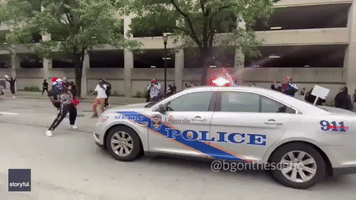 Protesters Dance in Front of Police Car During Breonna Taylor Protest in Louisville