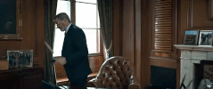 pierce brosnan phone GIF