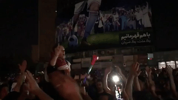 Despite World Cup Elimination Iranian Fans Celebrated Their Team on the Streets