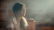 kacey musgraves blowing smoke GIF
