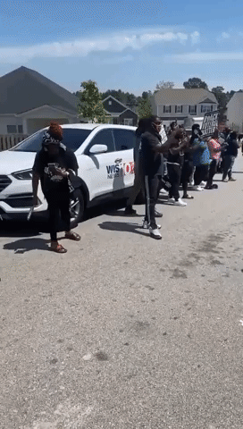 Demonstrators Assemble Outside Home of Soldier Charged With Threatening Black Man
