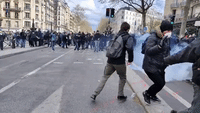 Protesters Hurl Projectiles at Police in Paris as Pension Reform Strikes Continue