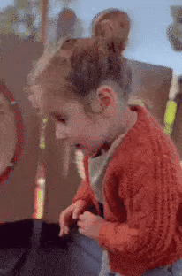 dianaarias_ cold ugh covering up orange sweater GIF