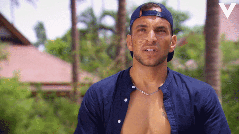 Reality TV gif. Damian Diepeveen on Temptation Island VIPs faces us, grits his teeth and puts his hands up to his head in a look of deep frustration.