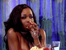Reality TV gif. Tiffany Pollard on Flavor of Love rolls her eyes to the back of her head while sipping out of a martini glass.