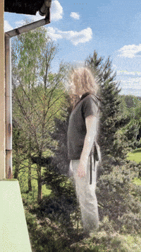Sidris peeking through the wall