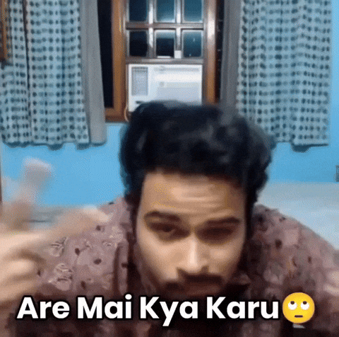 Video gif. A man sits in his room and puts his fingers on his temples and shrugs innocently. Text reads, "Are mai kya karu ho gaya."