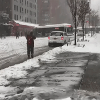Two New York City Buses Jackknife Within a Block in Snow
