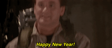 Movie gif. Bill Murray as Dr. Venkman in Ghostbusters yells, “Happy New Year!”