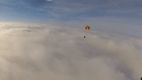 Paraglider Captures Footage of Flight Above the Clouds