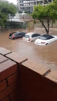Cars Submerged by Floodwater in Pretoria Suburb