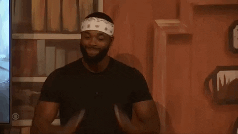 Reality TV gif. Monte Taylor on Big Brother Season 24 holds his hands up in a prayer position. He looks up and points to the sky to thank god. 