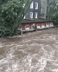 Deadly Flooding Turns 'Small' German River Into a 'Raging Monster'