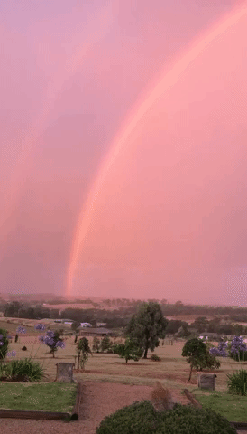 Double Rainbow Combines With Pink Sunset to Bring Glorious Evening to Australian Country Town