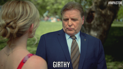 TV gif. David Rasche as Alden in Impastor wears a navy suit outside in a park, talking to a woman, and with gusto says, "Girthy"